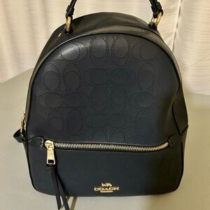 Coach Navy Leather Backpack with Gold Accents